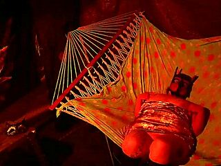 getting frisky in a tent, fingering her wet hole in a hammock