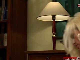 this blonde babe with big natural tits in nylon stockings gets naughty and slutty