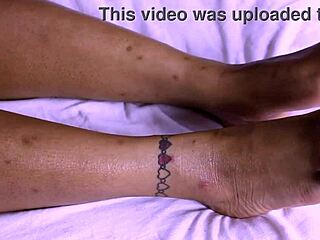 Sexy thick ebony girl gives footjob, making him cum all over her pretty feet.