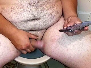 Dominant bear feels powerful arousal while stroking his thick cock