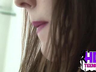 Hot little Kylie fingering myself up close in steamy bathroom