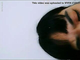 Hey, check out this hot Asian babe playing with her wet pussy using a bottle