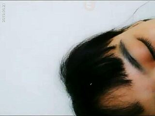 Hey, check out this hot Asian babe playing with her wet pussy using a bottle