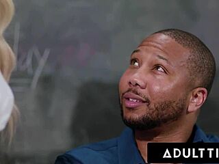 collegegirl emma hix talks to her teacher in classroom