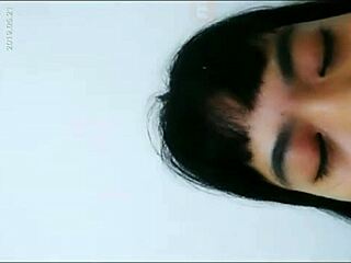 Hey, check out this hot Asian babe playing with her wet pussy using a bottle