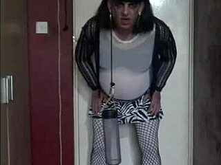 the sissy crossdresser returns to swallow his own piss eagerly