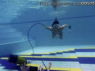 Adeline Gets Filmed By A Girl In The Pool. Outdoor Bathing Scene.