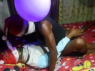 skinny girl enjoys christmas surprise with big gift