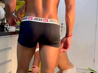 Blond twink in orgy gets fucked by two monster cocks, holding dick quiet while getting fully pounded.