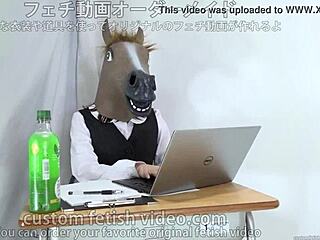 A female office worker navigates her masked routine in the workplace