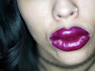 Extreme bimbo with lipstick sucking cock in fetish style