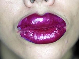 Extreme bimbo with lipstick sucking cock in fetish style