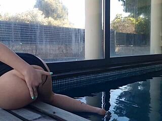 Watch this slutty amateur fingering her wet pussy in doggystyle position right by the open window.