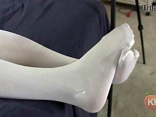 Detailed POV of Her Pantyhose Footjob Leading to Intense Cumshot in Fetish Femdom Scene