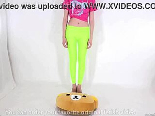 beautiful woman teases with high heels on cushion