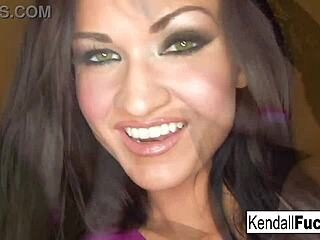 Kendall pulls off a sexy tease with a stock fetish vibe