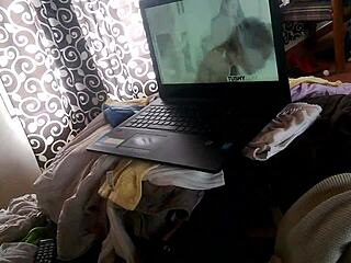 Amateur lesbian watches porn and masturbates alone at home