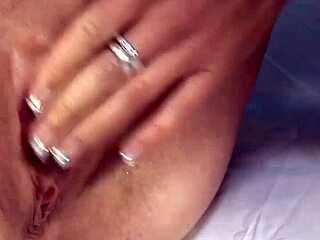 Is the man really pissing all over her face?