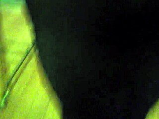 Tina teases with her feet in stockings.