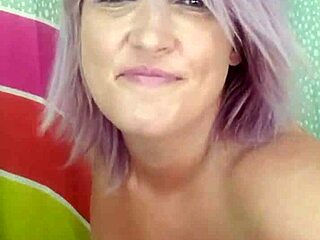 Suzie milf strips naked to show her big tits