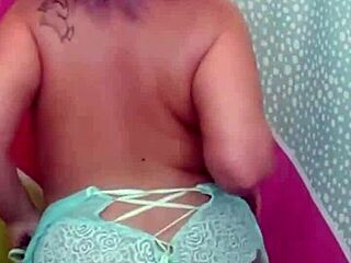 Suzie milf strips naked to show her big tits