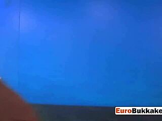 hot chick on bed as three men piss on her in turn