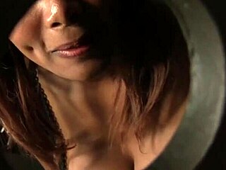 kymora lee, a black chick with big boobs, sucks a cock through a glory hole in a quickie