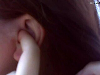 Nicoletta tries on earrings in her condominium garden for ear lovers