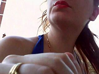 Nicoletta tries on earrings in her condominium garden for ear lovers