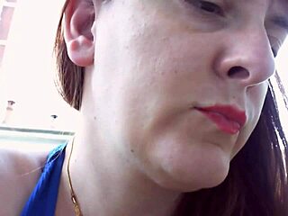 Nicoletta tries on earrings in her condominium garden for ear lovers