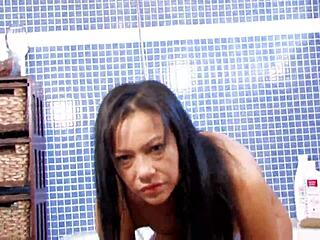 i'm nice lara tinelli doin a hot striptease in the shower, showin my big tits