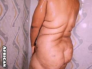 In the bath, she shows off her big ass and tits, inviting you to join