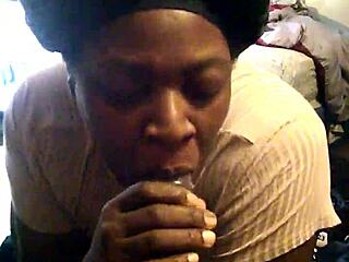 Grip big black cock and suck