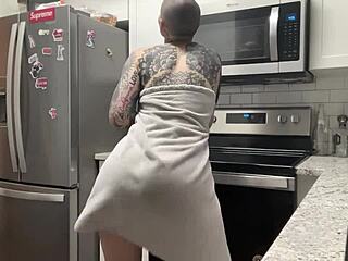 Young thug Elle twerks in kitchen with tight shorts on.