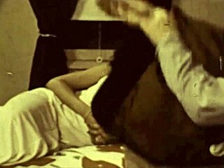 check out this vintage milf with a big clit rocking the retro porn scene like a pro.