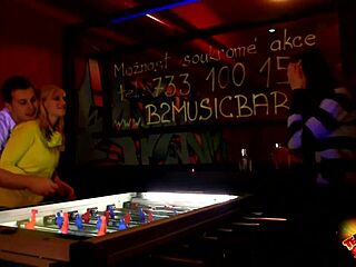 Agata plays video games in the room with friends