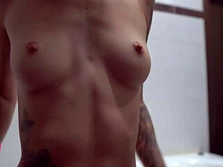 Horny skinny teen massages her titties in close-up homemade video. She explores kinky solo touches.