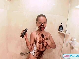 Teen Paris Milan spreads chocolate over her body for teasing fun