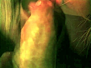 vintage scene with one mouth handling two cocks