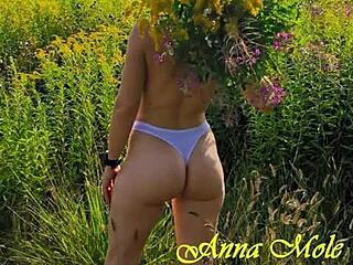 anna mole strolls in nature, showing off small breasts in shorts