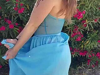 I tease with striptease outside, showing big ass