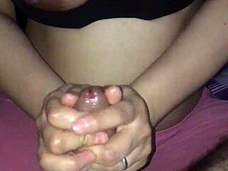 She strokes my cock with her hands, saying 'feel that big dick'