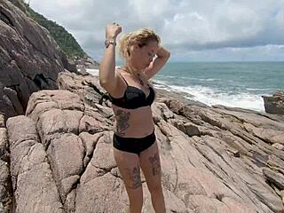 Latina milf teases by the seaside