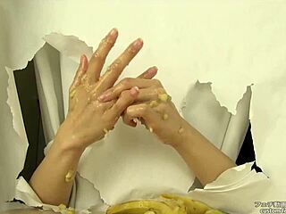 Asian Fetish Babe Crushes Banana with Hands in Messy Handjob Action