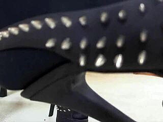 Sexy close-up shoe dangle in pantyhose