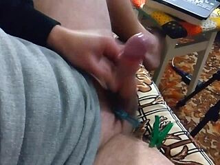 This guy’s rough solo cock handjob in BDSM style ends with cumshot.