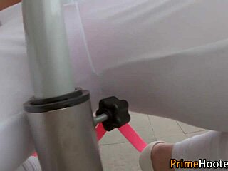 Look At That Redhead Oiling Her Big Tits!