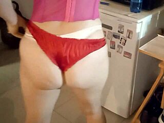 French woman in pink satin lingerie