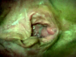 Caught my step mom using my favorite vibrator in the dark, secretly filmed her!