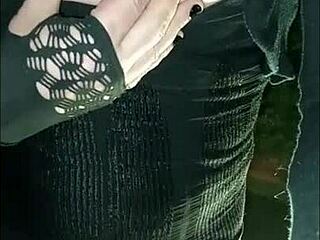 hey, check out this crossdresser with a small woman in the garden